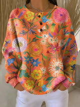 Isabel | Jersey naranja con flores
